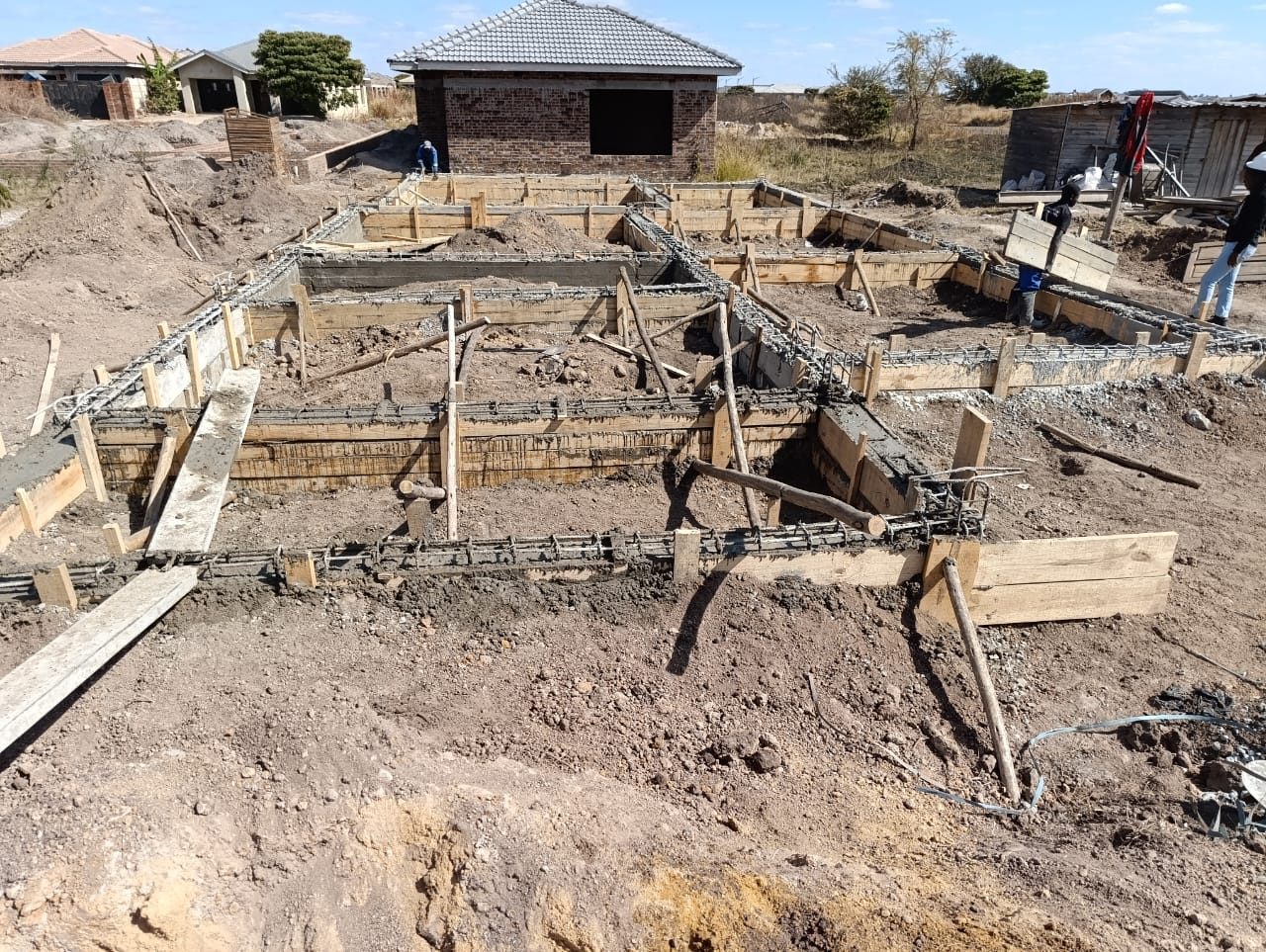 Foundation formwork and ground beams on a residential stand